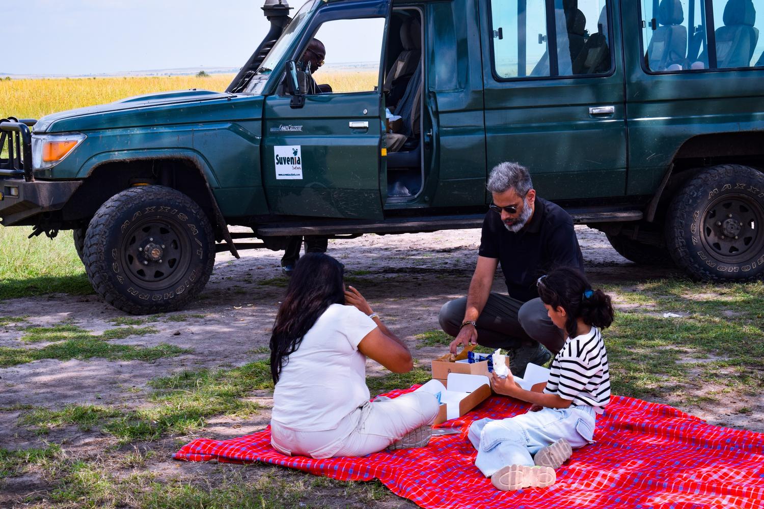 Bush picnic lunch set up on the Maasai Mara savannah plains Kenya